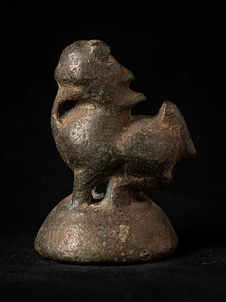 Antique Burmese bronze opium weight, 18th century, side view of the animal form on domed base