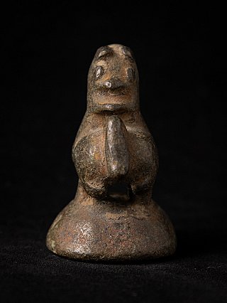 Burmese bronze opium weight, 18th century, front view with stylised head and domed base