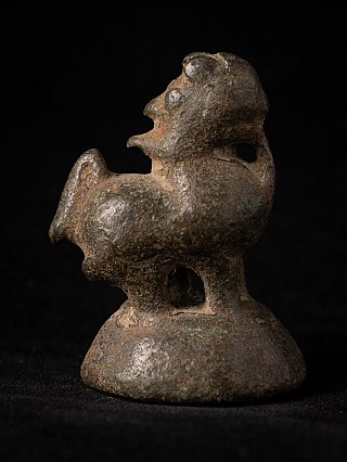 Antique Burmese bronze opium weight, 18th century, side profile showing the cut-out openings