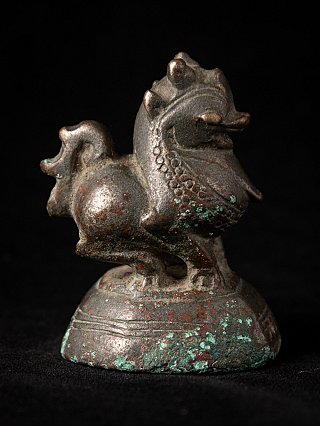 Bronze opium weight from Burma, animal figure with visible green patina