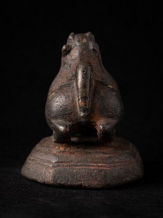 Antique bronze opium weight from Burma, rear view showing tail and round base