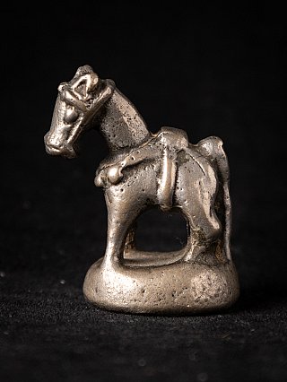 Burmese bronze opium weight shaped as an animal, left-facing side view on round base