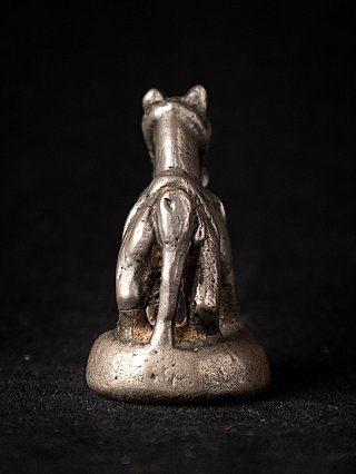Myanmar bronze opium weight, rear view showing tail and hind legs on the base