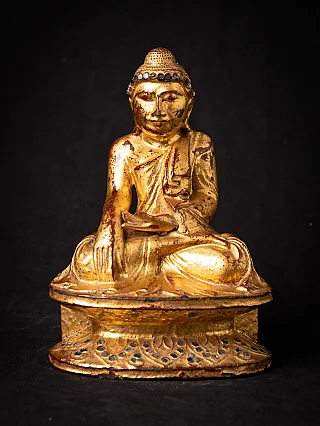 Antique wooden Burmese Buddha statue