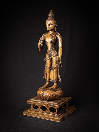 Lokeshwor statue from Nepal in bronze, standing on base, three-quarter left view