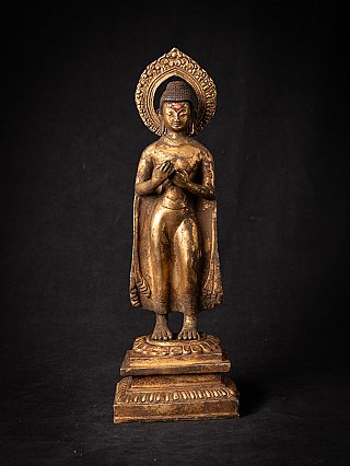 Nepali bronze Buddha statue, late 19th century, standing on stepped base, full-front view