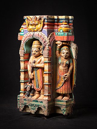 Indian wooden temple fragment with niche figure and side attendant, three-quarter right view