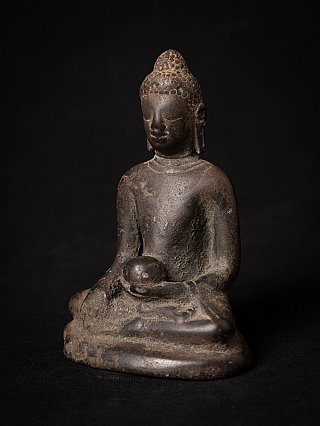 Antique Pyu bronze Buddha statue from Burma (Myanmar), three-quarter left view