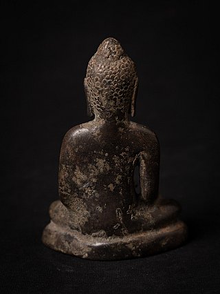 Pyu bronze Buddha statue, rear view showing hair knot and elongated earlobes