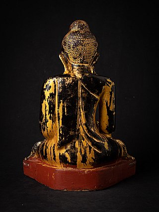 Burmese wooden Buddha statue, seated, rear view showing worn gilding on the back