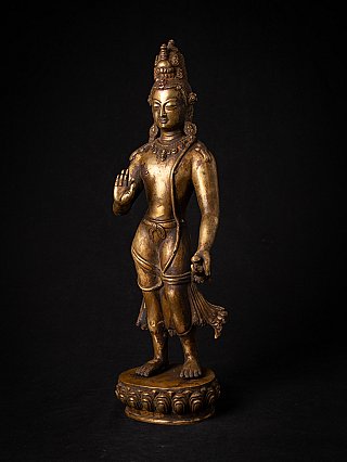 Bronze Lokeshwor statue from Nepal in three-quarter view on lotus base