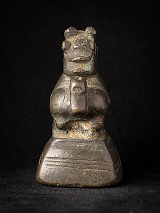 Burmese bronze opium weight, front view with stylised head and chest