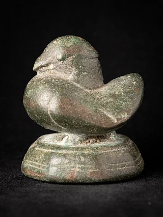 Antique bronze opium weight from Burma (Myanmar), three-quarter view of bird-shaped form