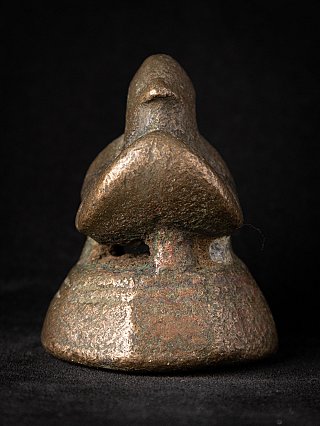 Bronzen opiumgewicht in vogelvorm, vooraanzicht met snavel en brede borst