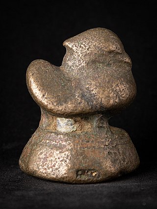 Antiek opiumgewicht van brons, vogelvorm van opzij met ronde staart