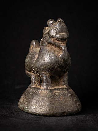 Bronze opium weight from Burma (Myanmar) G-191, three-quarter view highlighting head and chest