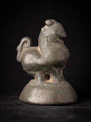 Bronze opium weight from Burma (Myanmar), side profile with the head and curled tail