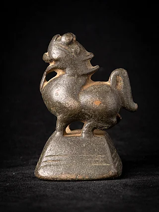 Antique bronze opium weight from Burma, animal-form figure on trapezoid base in side view