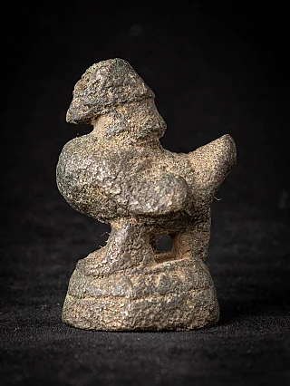 Antique Burmese bronze opium weight, animal-shaped form in left side view on base