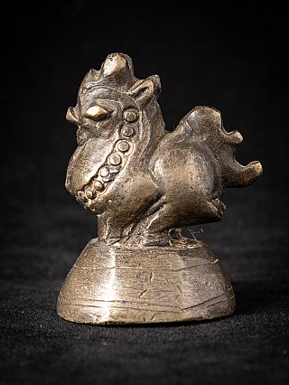Bronze opium weight from Burma (Myanmar), animal-form piece in three-quarter view
