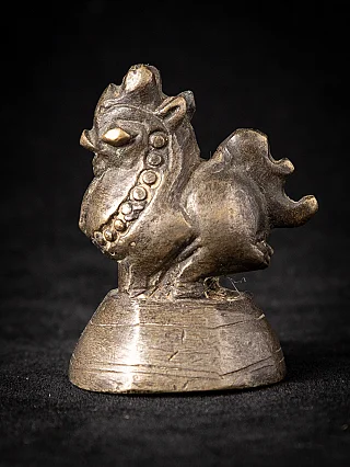 Bronze opium weight from Burma (Myanmar), animal-form piece in three-quarter view
