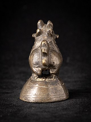 Antique bronze opium weight from Burma (Myanmar), rear view showing tail and rounded base
