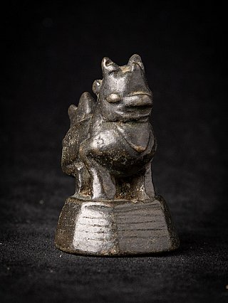 Burmese bronze opium weight, 19th century, angled front view of the head