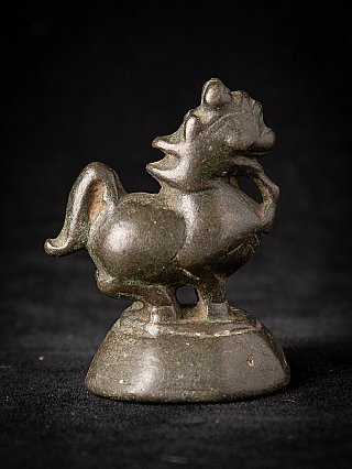 Burmese bronze opium weight, animal figure in side view from the opposite side
