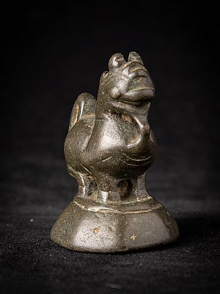 Burmese bronze opium weight, three-quarter view highlighting the head and chest