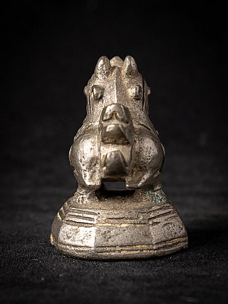 Bronze opium weight from Burma (Myanmar), animal figure seen from the front on stepped base