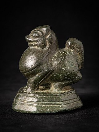 Burmese bronze opium weight statue, three-quarter left view showing head and stepped base