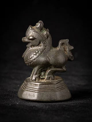 Burmese bronze opium weight, animal-shaped figure on base in left profile