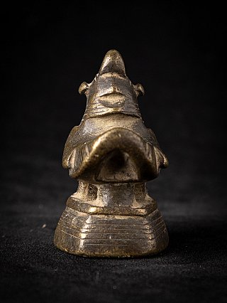 Burmese bronze opium weight, bird with prominent beak and eyes, front view