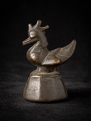 Bronze opium weight from Burma (Myanmar), animal figure on pedestal in side view