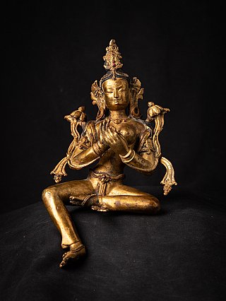 Nepali Tara bronze statue seated, full front view with hands in dharmachakra mudra