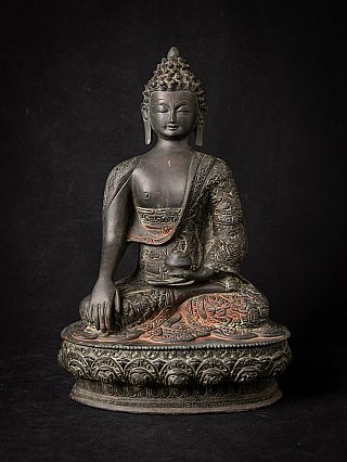 Indian bronze Buddha statue seated in bhumisparsha mudra, full front view