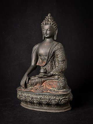 Indian bronze Buddha statue with engraved robe, three-quarter view
