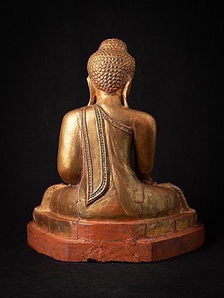 Seated Buddha statue in Mandalay style, wooden, rear view showing robe over back