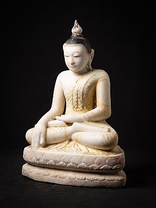 Marble Buddha statue from Burma (Myanmar), three-quarter view showing the lotus base