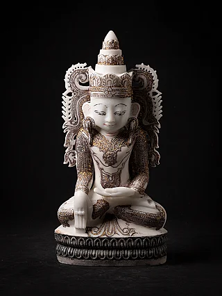 Old marble crowned Buddha statue