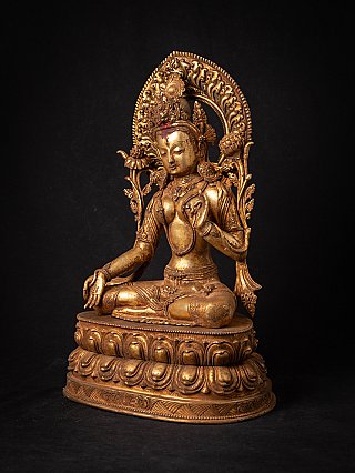 White Tara Buddha statue in Nepali bronze, three-quarter view showing lotus base and halo