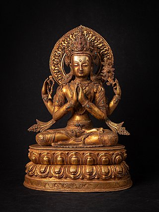 Chenrezig bronze statue from Nepal, seated with hands in namaskara mudra, full front view