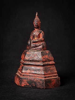 Antique wooden Thai Buddha statue