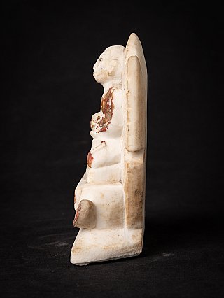 Burmese marble monk statue, seated, side profile showing the tall back panel