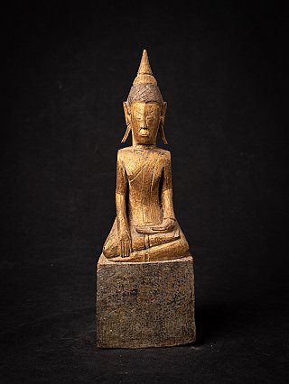 Wooden Lanna Buddha statue from Thailand on tall base, full front view