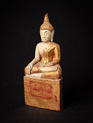 Wooden Thai Lanna Buddha statue with gilded surface, three-quarter left view