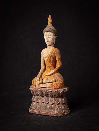 Antique wooden Thai Buddha statue