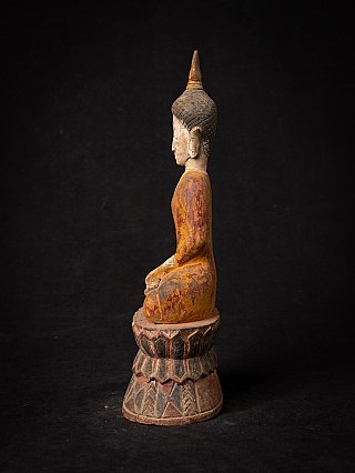 Antique wooden Thai Buddha statue