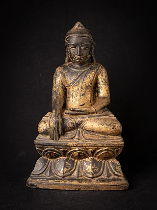 Antique wooden Burmese Buddha statue