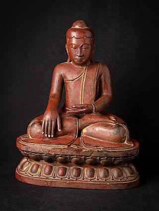 Wooden Burmese Buddha statue seated in bhumisparsha mudra on lotus base, full front view